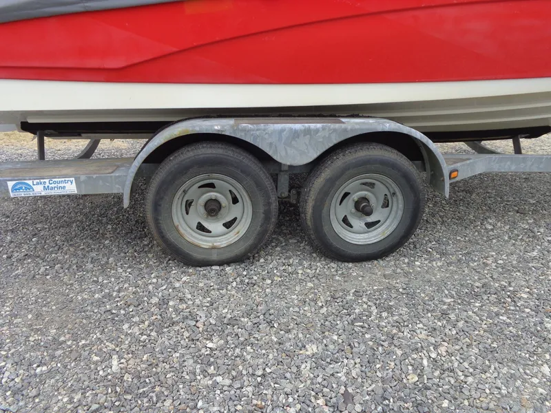 Slide: The Image of 2008 Yamaha AR210 boat on trailer, close-up of wheels. - 7