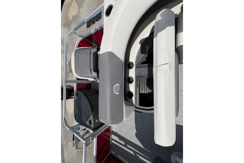 Slide: The Image of 2026 Sun Tracker Bass Buggy 18 DLX interior with seating and console details. - 16