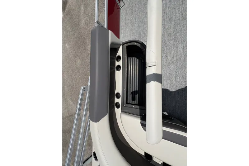 Slide: The Image of 2026 Sun Tracker Bass Buggy 18 DLX interior detail with seating and storage compartment. - 15