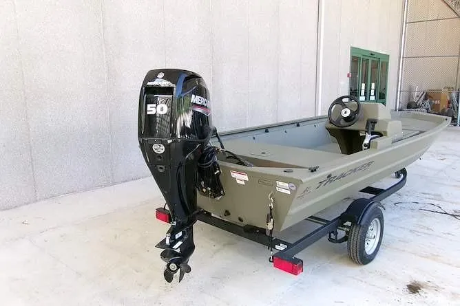 Slide: The Image of 2026 Tracker Grizzly 1648 SC boat on trailer with Mercury 50 HP outboard motor. - 2