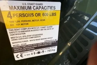 Slide: The Image of Capacity label on 2026 Ranger Z519R boat: 4 persons or 600 lbs. - 90