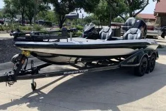 The Image of 2026 Ranger Z519R boat on trailer, parked outdoors, showcasing sleek design and modern features. - 0