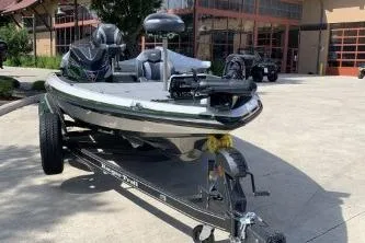 Slide: The Image of 2026 Ranger Z519R boat on trailer in sunny outdoor setting. - 3