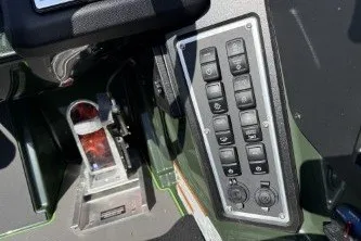 Slide: The Image of Control panel of 2026 Ranger Z519R boat with switches and throttle lever. - 91
