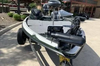 Slide: The Image of 2026 Ranger Z519R boat on trailer, parked outdoors, showcasing sleek design and modern features. - 8