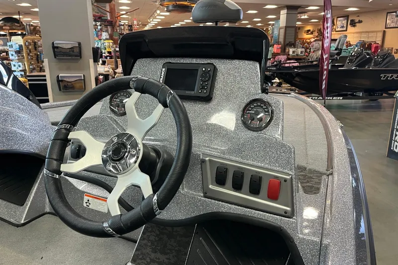 Slide: The Image of Steering console of a 2026 Nitro Z19 XL boat in showroom. - 4