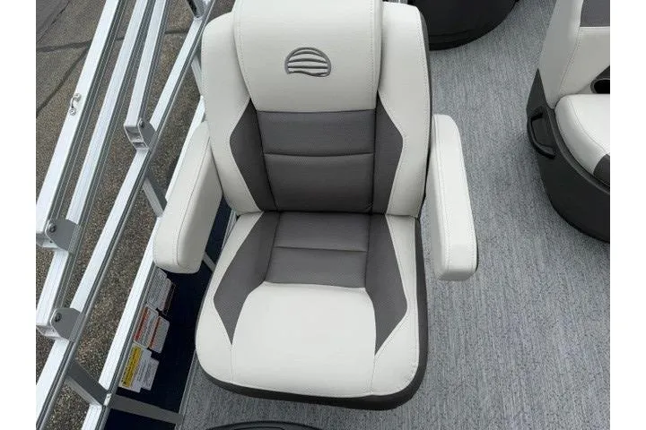 Slide: The Image of Captain's chair on 2026 Sun Tracker Bass Buggy 18 DLX pontoon boat, featuring gray and white upholstery. - 8