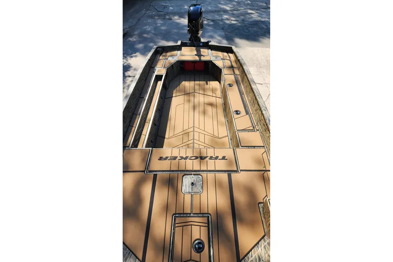 Slide: The Image of 2026 Tracker Grizzly 1756 T Marsh boat interior with custom deck design. - 5