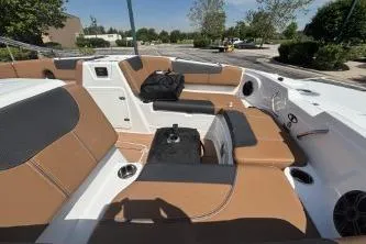 Slide: The Image of Luxurious interior of 2026 Tahoe 1950 boat with tan and gray seating. - 112