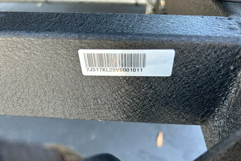 Slide: The Image of Barcode on 2026 Tracker Grizzly 2072 Utility, displaying serial number. - 26