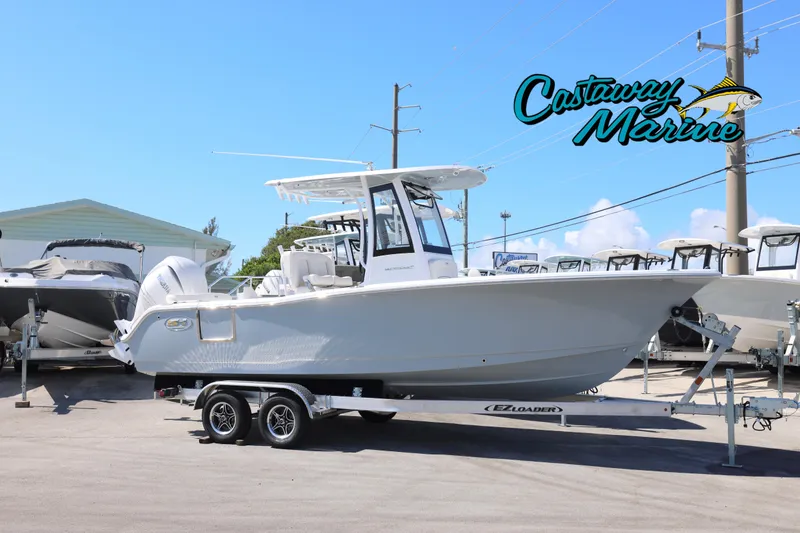 The Image of 2026 Sea Hunt Ultra 239 SE boat on trailer at Castaway Marine dealership. - 0