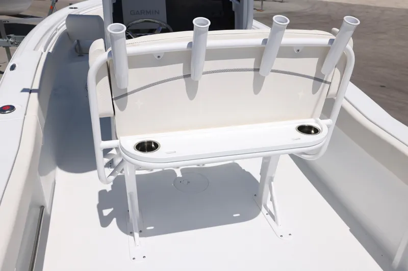 Slide: The Image of 2026 Sea Hunt Ultra 239 SE boat with rod holders and cup holders on deck. - 10