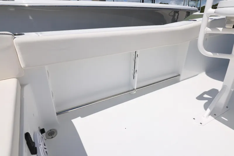 Slide: The Image of 2026 Sea Hunt Ultra 239 SE boat interior, featuring sleek white seating and modern design elements. - 13