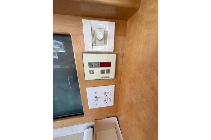 Slide: The Image of Control panel and outlets on 1997 Navigator Pilothouse yacht interior. - 43
