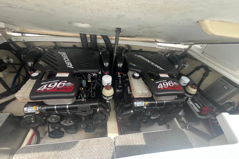 Slide: The Image of Twin Mercury MerCruiser 496 MAG engines in a 2006 Formula 330 Sun Sport boat. - 15