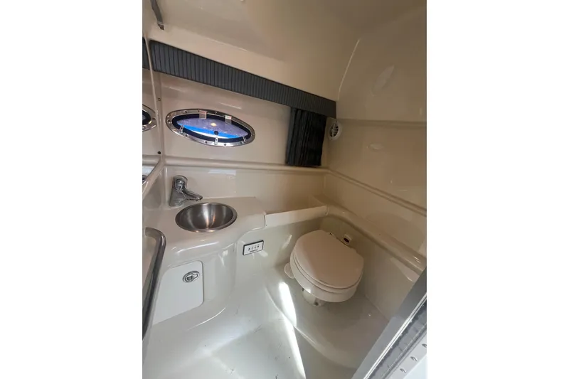 Slide: The Image of Interior of 2006 Formula 330 Sun Sport boat bathroom with sink and toilet. - 21