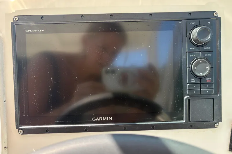 Slide: The Image of Garmin GPSmap XSV on 2017 Sailfish 245 DC boat dashboard. - 16