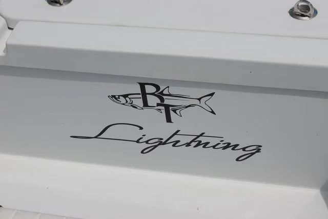 Slide: The Image of Beavertail Lightning 2019 boat logo with fish graphic. - 20