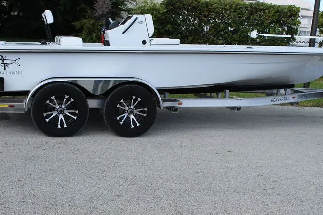 Slide: The Image of 2019 Beavertail Lightning boat on trailer, side view. - 22