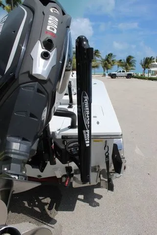 Slide: The Image of 2019 Beavertail Lightning boat with outboard motor at the beach. - 24