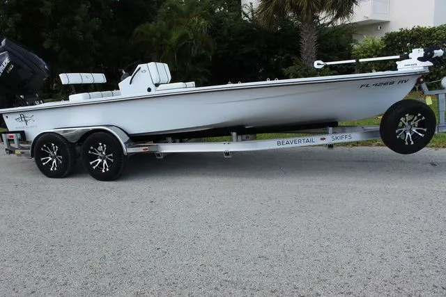 Slide: The Image of 2019 Beavertail Lightning skiff on trailer, side view. - 4