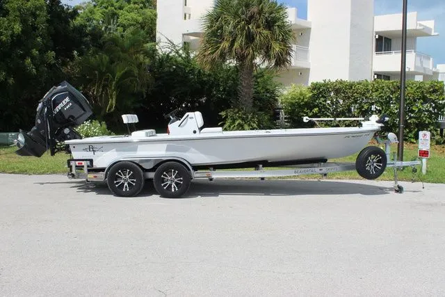 Slide: The Image of 2019 Beavertail Lightning boat on trailer, side view. - 5