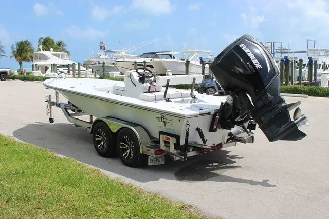 Slide: The Image of 2019 Beavertail Lightning boat on trailer at marina. - 8