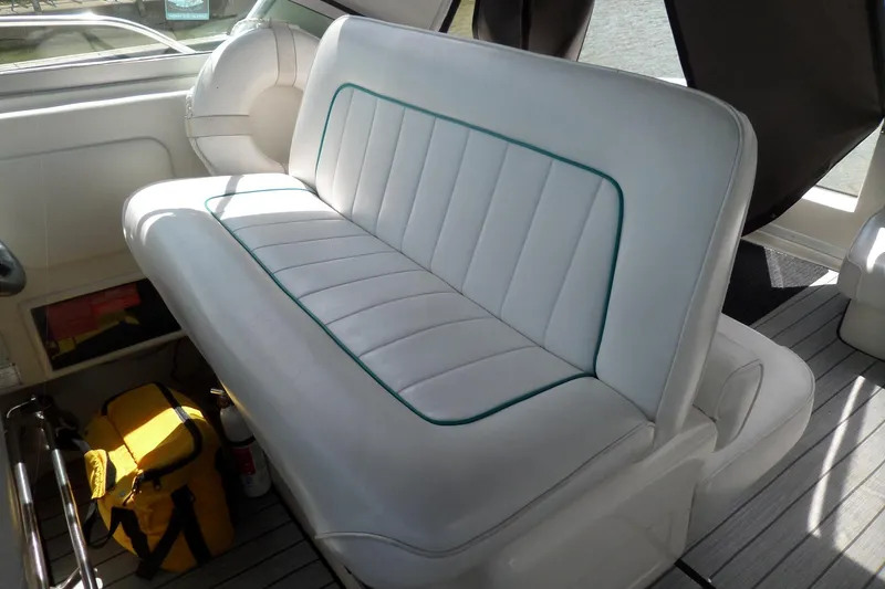 Slide: The Image of White seating on 1994 Sea Ray 370 Express Cruiser boat interior. - 15