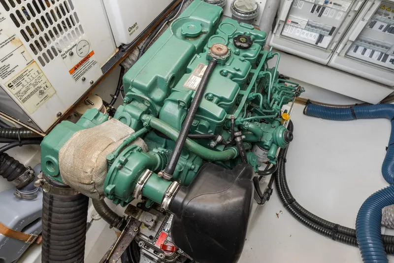 Slide: The Image of Engine room of 2019 Fountaine Pajot 47 catamaran with green marine engine. - 71