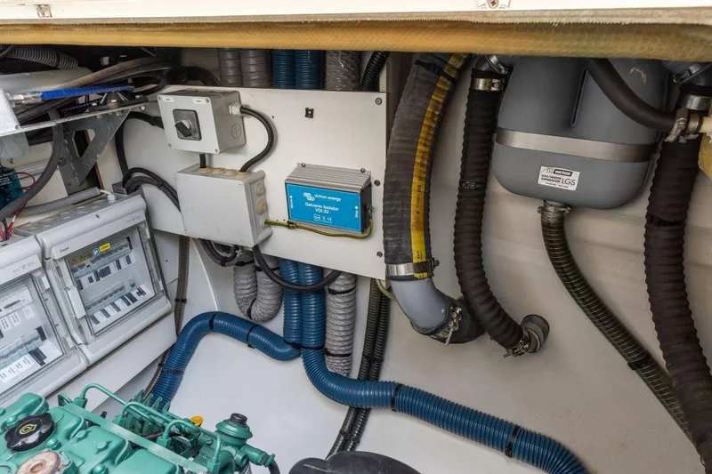 Slide: The Image of Engine room of 2019 Fountaine Pajot 47 catamaran with electrical components and wiring. - 72