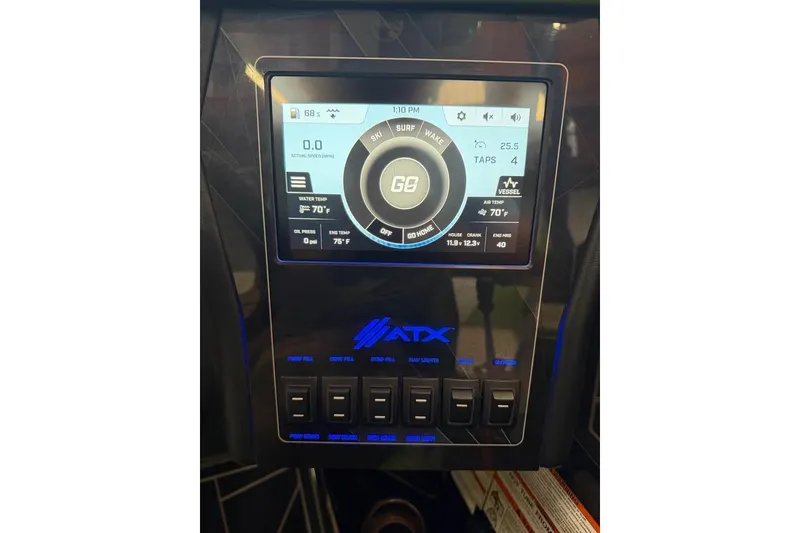 Slide: The Image of ATX Surf Boats 24 Type-S 2022 dashboard display with control panel and digital screen. - 13