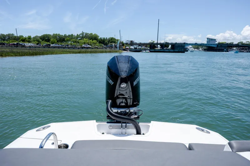 Slide: The Image of 2024 Monterey M-45 boat with Mercury engine on a calm river near a bridge. - 37