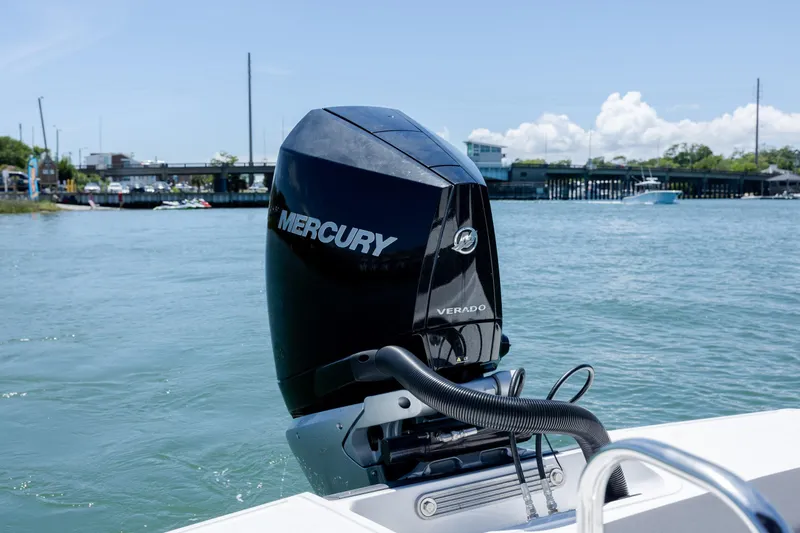 Slide: The Image of Outboard motor on 2024 Monterey M-45 boat, Mercury Verado, on calm water. - 38