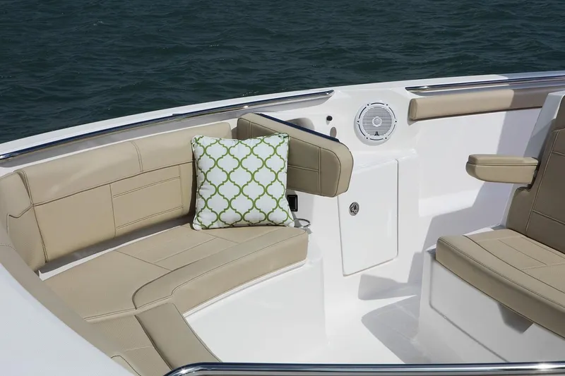 Slide: The Image of Manufacturer Provided Image: 2021 Pursuit S 328 Sport boat interior with beige seating and decorative pillow. - 31