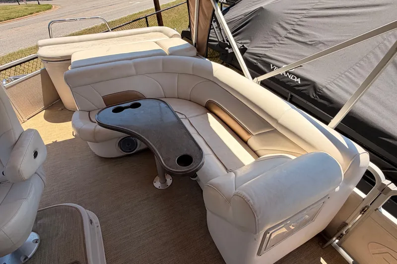 Slide: The Image of Luxurious seating area on a 2006 Premier 250 Grand Majestic RE pontoon boat. - 5
