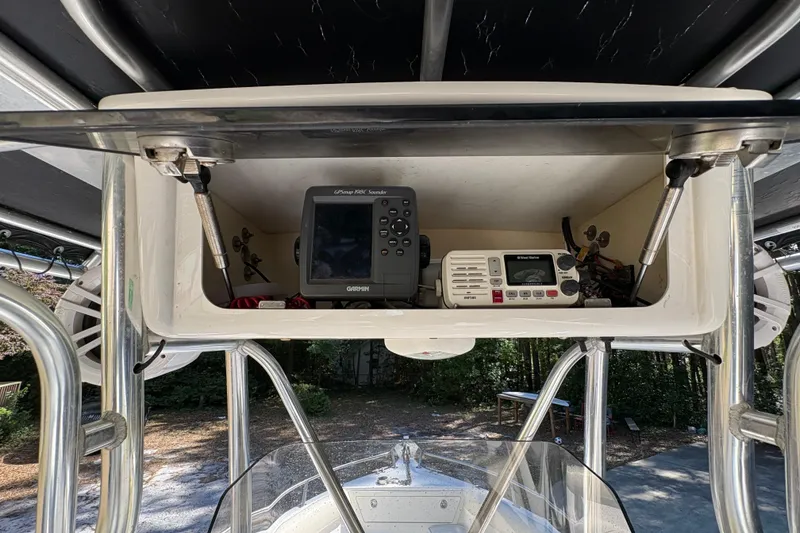 Slide: The Image of 2005 Century 2200 Center Console with Garmin GPS and marine radio equipment. - 24