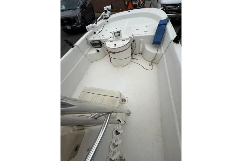 Slide: The Image of 2008 Carolina Skiff 218 DLV boat interior with seating and equipment. - 13