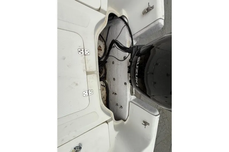 Slide: The Image of 2008 Carolina Skiff 218 DLV boat with Suzuki outboard motor, top view. - 18