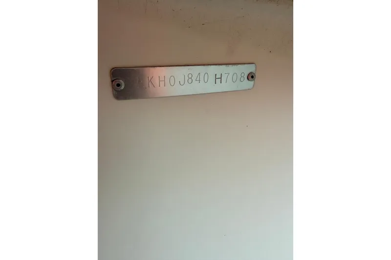 Slide: The Image of 2008 Carolina Skiff 218 DLV hull identification number plate on boat. - 20