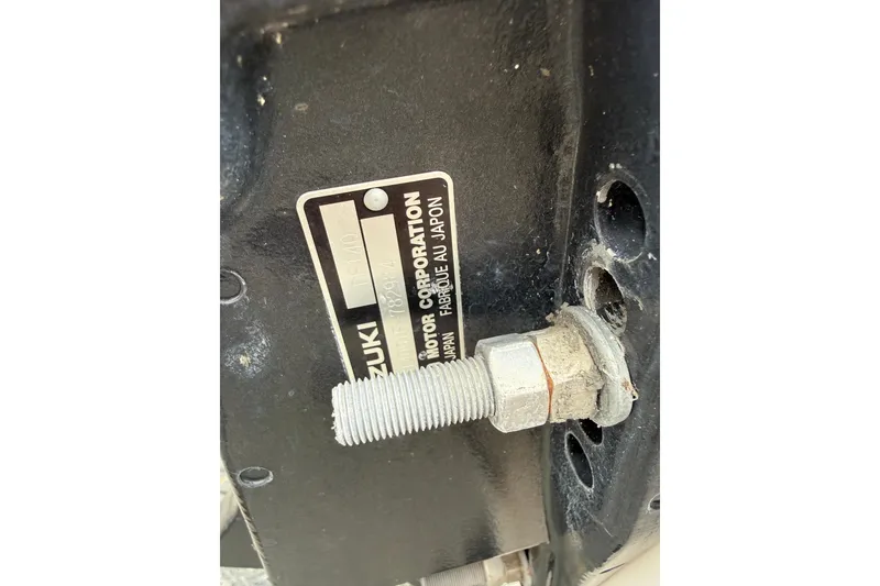 Slide: The Image of Close-up of a Suzuki motor part on a 2008 Carolina Skiff 218 DLV boat. - 21