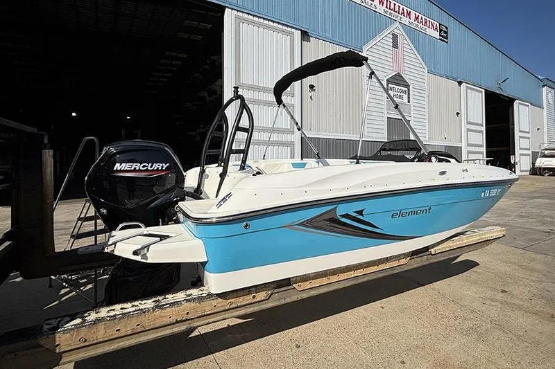 Slide: The Image of 2022 Bayliner Element E18 boat with Mercury engine at marina. - 3