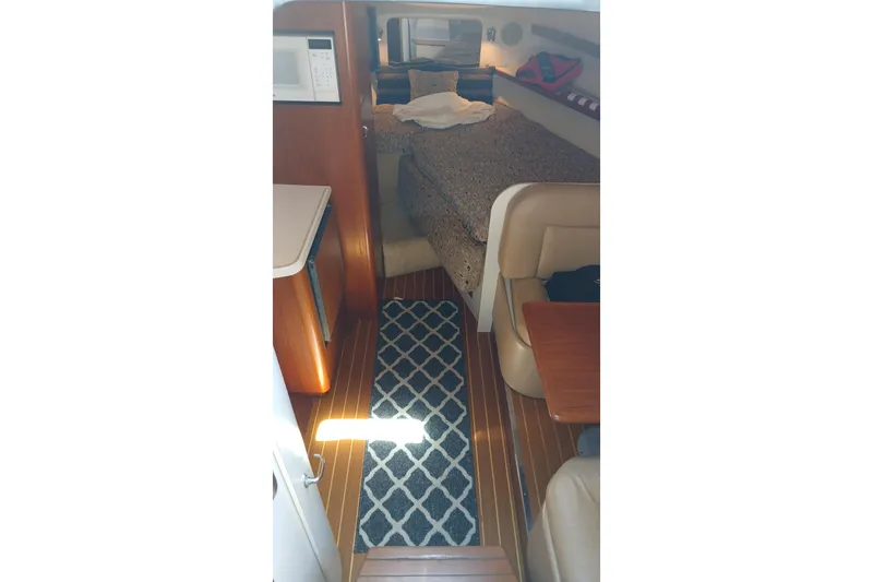 Slide: The Image of Control panel of a 2001 Tiara Yachts 2900 Open, featuring navigation and engine gauges. - 17