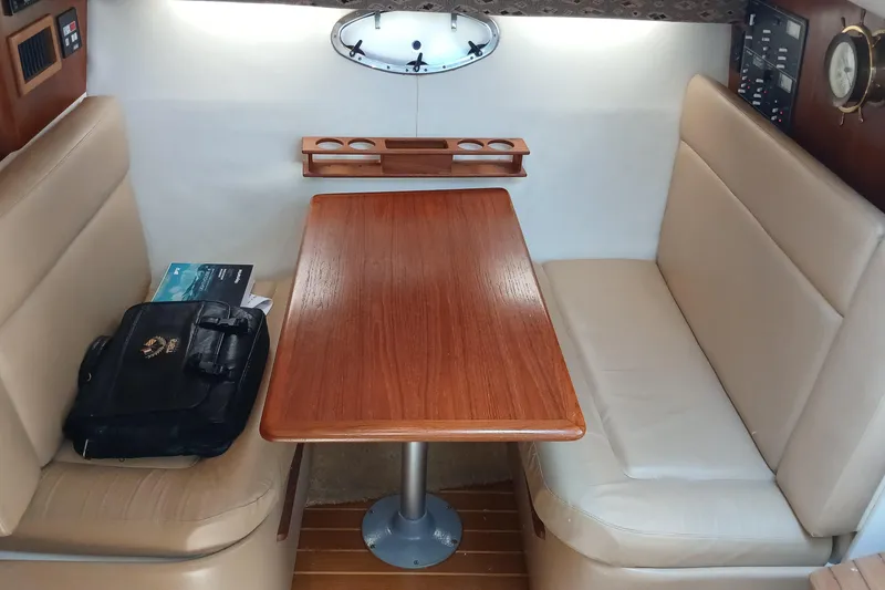 Slide: The Image of 2001 Tiara Yachts 2900 Open galley with sink and cooktop. - 21