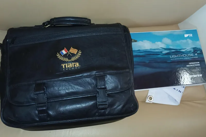 Slide: The Image of Black Tiara Yachts bag with manual, 2001 Tiara 2900 Open model. - 30