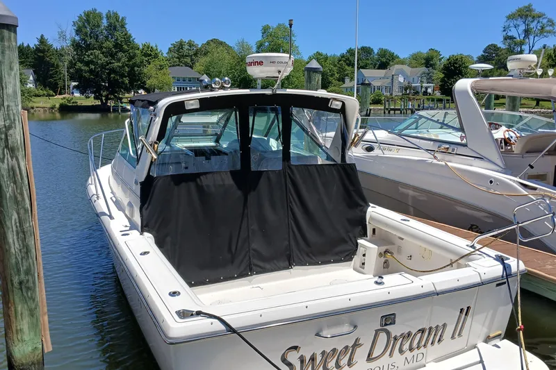 Slide: The Image of 2001 Tiara Yachts 2900 Open docked in Annapolis marina, named "Sweet Dream II". - 6
