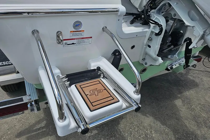 Slide: The Image of 2026 Sea Pro 202 Center Console boat with swim platform and stainless steel ladder. - 24