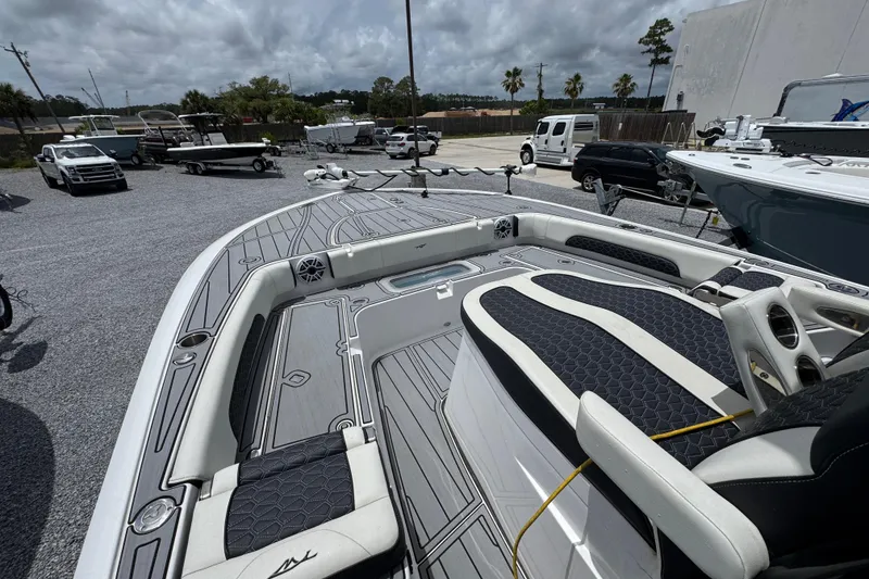 Slide: The Image of 2024 Tidewater 3100 Carolina Bay boat interior with sleek seating and modern design. - 14