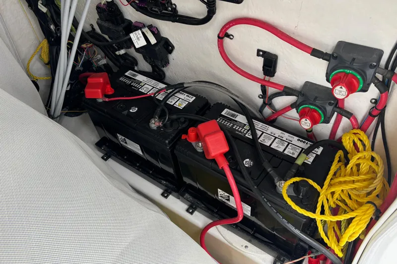 Slide: The Image of Electrical system of a 2016 Tidewater 252 CC Adventure boat with batteries and wiring. - 17