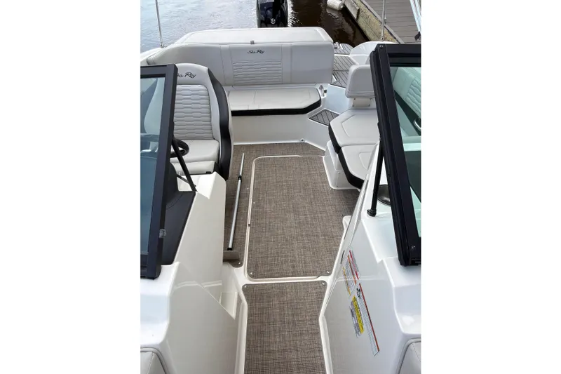 Slide: The Image of Interior view of 2021 Sea Ray SPX 190 boat with seating and flooring. - 13