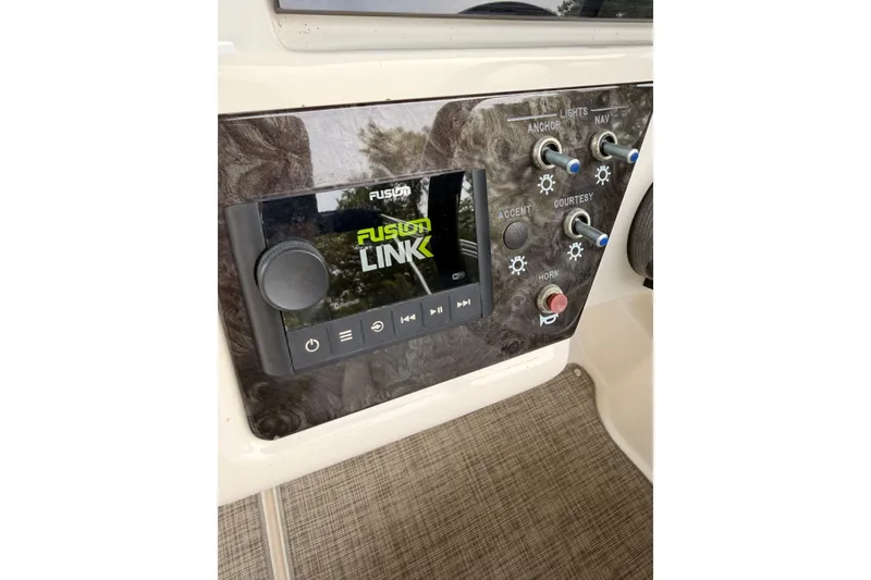 Slide: The Image of Control panel of 2021 Sea Ray SPX 190 boat with Fusion Link audio system. - 19
